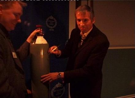 Anders Palm, Olivier Isler signing the Bottle of Fame
